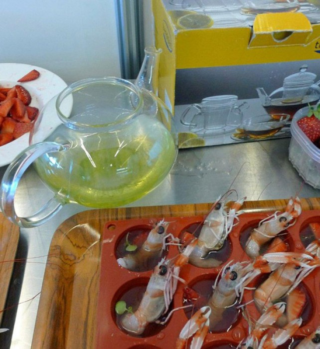 Creative bites combining prawns, with jellied green tea, and strawberries.