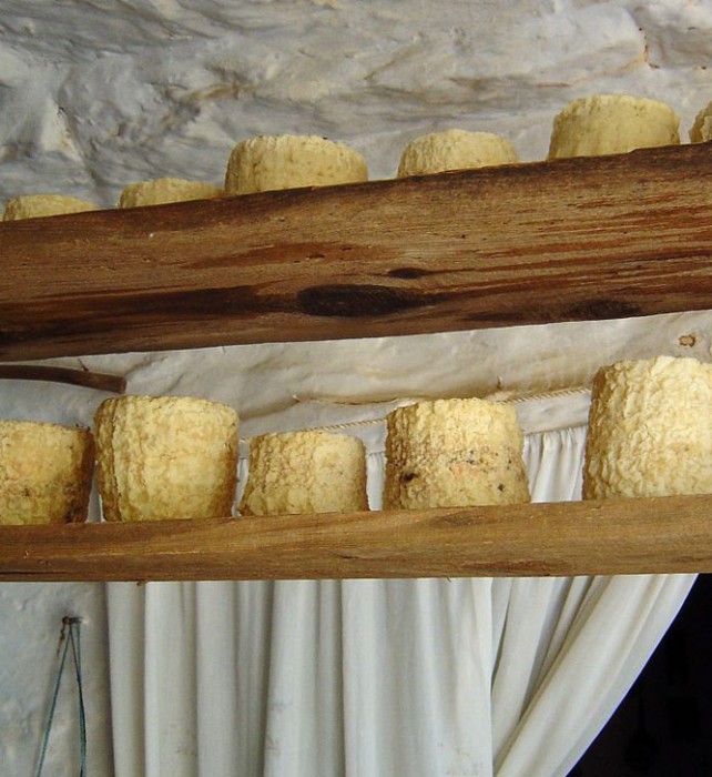 On the islands cheeses are left to dry on boards hanging from the roof beams.