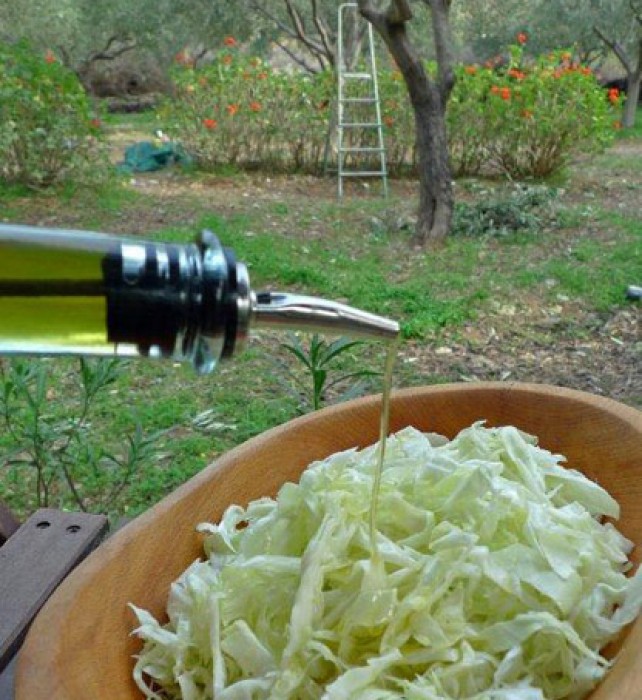 Shredded cabbage salad dressed with lemon and our first olive oil.
