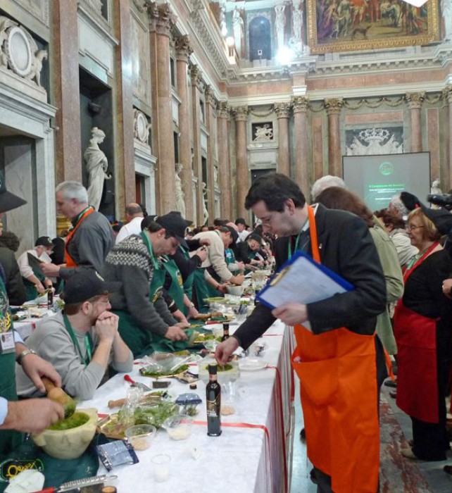 Wearing red aprons, the judges tasted and noted.