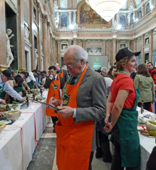 Wearing red aprons, the judges tasted and noted.