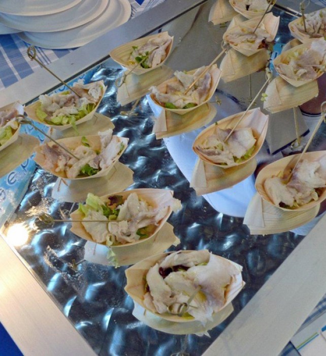 Delicious raw farmed bream, marinated in lemon and herbs.